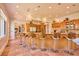 Gourmet kitchen with large island, bar seating, and stainless appliances, perfect for entertaining at 794 Rutland Ct, Lithonia, GA 30058