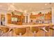 Spacious kitchen featuring granite counters, wood cabinets, pendant lighting, and stainless steel appliances at 794 Rutland Ct, Lithonia, GA 30058