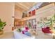 Spacious living room with a high ceiling and balcony offers an abundance of space to gather and relax at 794 Rutland Ct, Lithonia, GA 30058