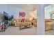 Comfortable living room with neutral tones, plush seating, and natural light at 794 Rutland Ct, Lithonia, GA 30058