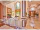 Elegant living room showcasing a grand entrance, high ceilings, large windows, and a cozy fireplace for a welcoming atmosphere at 794 Rutland Ct, Lithonia, GA 30058