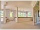 Bright loft space with lots of natural light, pendant lighting, and neutral carpet at 794 Rutland Ct, Lithonia, GA 30058