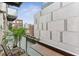Exterior balcony space with chairs and city views at 805 Peachtree Ne St # 411, Atlanta, GA 30308