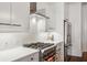 Clean kitchen featuring white cabinets, stainless steel appliances, and gas range at 805 Peachtree Ne St # 411, Atlanta, GA 30308