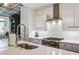 Modern kitchen with white cabinets, subway tile backsplash, and stainless steel appliances at 805 Peachtree Ne St # 411, Atlanta, GA 30308