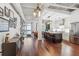 Bright open-concept living room and kitchen featuring hardwood floors and modern decor at 805 Peachtree Ne St # 411, Atlanta, GA 30308