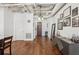 Open-concept space with modern decor, hardwood floors, and exposed ceiling features at 805 Peachtree Ne St # 411, Atlanta, GA 30308
