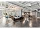 Modern lounge area with sleek seating, polished concrete floors, and an open layout perfect for relaxation and socializing at 805 Peachtree Ne St # 411, Atlanta, GA 30308
