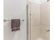 Shower area with tiled walls and a glass door at 805 Peachtree Ne St # 411, Atlanta, GA 30308