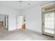 Bedroom featuring neutral carpet, ceiling fan, with doors to bathroom and kitchen at 825 Highland Lane Northeast Ne # 1313, Atlanta, GA 30306