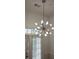 Modern chandelier with unique design adding an elegant touch to the home's interior at 825 Highland Lane Northeast Ne # 1313, Atlanta, GA 30306
