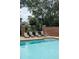 Outdoor pool area has comfortable lounge chairs next to the pool's edge with a ladder at 825 Highland Lane Northeast Ne # 1313, Atlanta, GA 30306