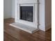 Fireplace with stone surround and hearth at 825 Highland Lane Northeast Ne # 1313, Atlanta, GA 30306