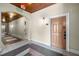 Hallway with tile flooring, painted walls, and a door with unit number at 825 Highland Lane Northeast Ne # 1313, Atlanta, GA 30306