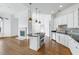 Stylish kitchen with granite counters, stainless steel appliances, and an island cooktop at 825 Highland Lane Northeast Ne # 1313, Atlanta, GA 30306