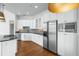 Well-equipped kitchen with stainless steel appliances, granite countertops, and ample storage space at 825 Highland Lane Northeast Ne # 1313, Atlanta, GA 30306