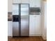 Close-up of modern stainless steel refrigerator and microwave oven in a well-designed kitchen at 825 Highland Lane Northeast Ne # 1313, Atlanta, GA 30306