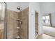 Shower with tile surround, built-in shelves, and adjustable shower head at 825 Highland Lane Northeast Ne # 1313, Atlanta, GA 30306