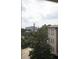 View of the city skyline and surrounding neighborhood at 825 Highland Lane Northeast Ne # 1313, Atlanta, GA 30306