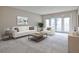 Bright living room with stylish furniture and glass doors offering seamless indoor-outdoor living at 3650 Ashford Dunwoody Ne Rd # 514, Atlanta, GA 30319