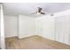 Bedroom with large closet, ceiling fan, and bright natural light at 6940 Roswell Road Rd # 16B, Atlanta, GA 30328