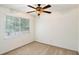 Bedroom with carpet, ceiling fan and bright window at 6940 Roswell Road Rd # 16B, Atlanta, GA 30328