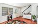 Charming entryway with staircase, decor, and natural light from a large window at 6940 Roswell Road Rd # 16B, Atlanta, GA 30328