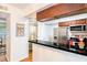 Modern kitchen featuring sleek black countertops, stainless steel appliances, and dark wood cabinets, designed for functionality at 6940 Roswell Road Rd # 16B, Atlanta, GA 30328