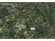 Aerial view of McDonough, GA, showcasing the property's location amidst lush greenery and close to the Tussahaw Reservoir at 705 S Bethany Rd, Mcdonough, GA 30252