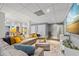 Finished basement featuring a large sectional sofa, recessed lighting, and modern decor at 705 S Bethany Rd, Mcdonough, GA 30252