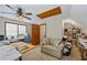 Versatile bonus room with a ceiling fan, comfortable seating and lots of natural light at 705 S Bethany Rd, Mcdonough, GA 30252