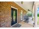 Spacious front porch with classic rocking chairs and a swing, perfect for relaxing outdoors at 705 S Bethany Rd, Mcdonough, GA 30252