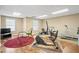 Bright gym area with fitness equipment, natural light, and light-colored walls, creating an inviting workout space at 922 Florence Rd, Douglasville, GA 30134
