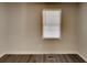 This is a light-filled room featuring neutral walls, and wood-style flooring at 365 Wesley Mill Pl, Villa Rica, GA 30180