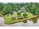 Aerial view of community featuring pool and gazebo near lake at 1065 Bookhout Drive Dr, Cumming, GA 30041
