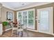 Cozy breakfast nook with natural light, complemented by hardwood flooring at 1065 Bookhout Drive Dr, Cumming, GA 30041
