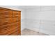 Spacious walk-in closet with wire shelving and custom wood dresser storage at 1065 Bookhout Drive Dr, Cumming, GA 30041