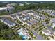 An aerial view showcasing the community's well-planned layout, lush landscaping, and inviting community pool at 621 Hanlon Way, Alpharetta, GA 30009