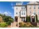 Charming townhome featuring a brick facade, well-maintained landscaping, and an inviting front entrance at 621 Hanlon Way, Alpharetta, GA 30009