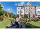 Beautiful townhome with a landscaped yard and outdoor seating area, perfect for relaxing and entertaining guests at 621 Hanlon Way, Alpharetta, GA 30009