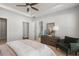 A spacious main bedroom has a large closet, ensuite bathroom, and a dark wood dresser at 621 Hanlon Way, Alpharetta, GA 30009