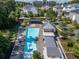 Aerial view of community pool area with lounge chairs, shelters, and landscaping at 621 Hanlon Way, Alpharetta, GA 30009