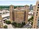Charming architecture amidst a vibrant cityscape with lush greenery at 75 Ponce De Leon Ne Ave # 1006, Atlanta, GA 30308