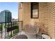 Balcony with outdoor seating and planter boxes offering city views at 75 Ponce De Leon Ne Ave # 1006, Atlanta, GA 30308