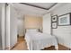 Bright bedroom with a neutral color scheme and wood floors throughout the room at 75 Ponce De Leon Ne Ave # 1006, Atlanta, GA 30308