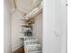 Walk-in closet with built in shelving, wire baskets, and wood floors at 75 Ponce De Leon Ne Ave # 1006, Atlanta, GA 30308