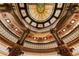 Intricate stained glass dome ceiling with ornate details and elegant architectural design at 75 Ponce De Leon Ne Ave # 1006, Atlanta, GA 30308