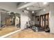 Well-equipped gym with weights, machines, and mirrors for a complete workout experience at 75 Ponce De Leon Ne Ave # 1006, Atlanta, GA 30308