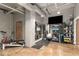Well-equipped gym with weights, machines, and mirrors for a complete workout experience at 75 Ponce De Leon Ne Ave # 1006, Atlanta, GA 30308