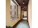 Hallway leading to rooms with high ceilings and a view of the outside and large windows at 75 Ponce De Leon Ne Ave # 1006, Atlanta, GA 30308